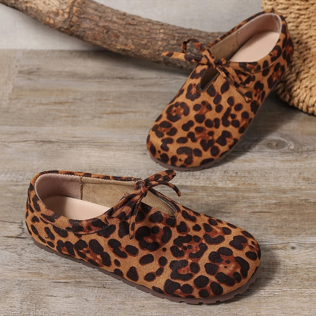 Mocassini leopardati in camoscio sintetico con fiocco donna