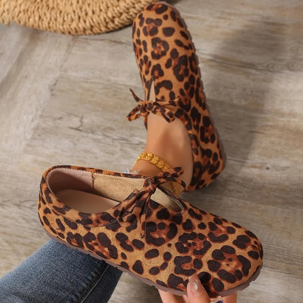 Mocassini leopardati in camoscio sintetico con fiocco donna