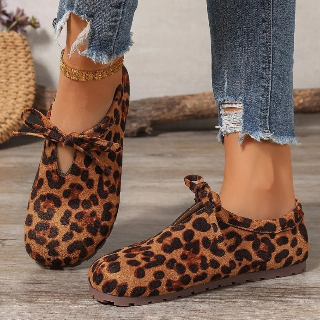 Mocassini leopardati in camoscio sintetico con fiocco donna