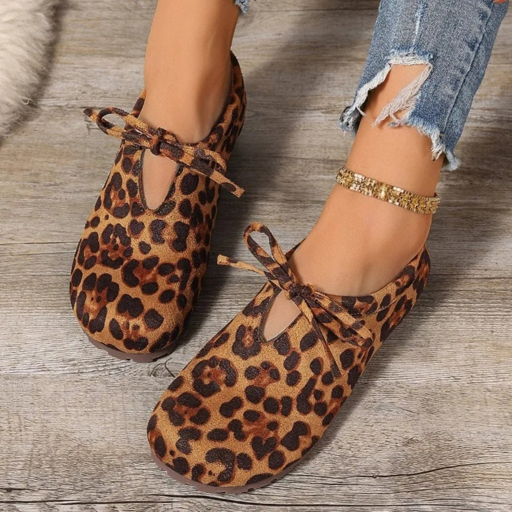 Mocassini leopardati in camoscio sintetico con fiocco donna