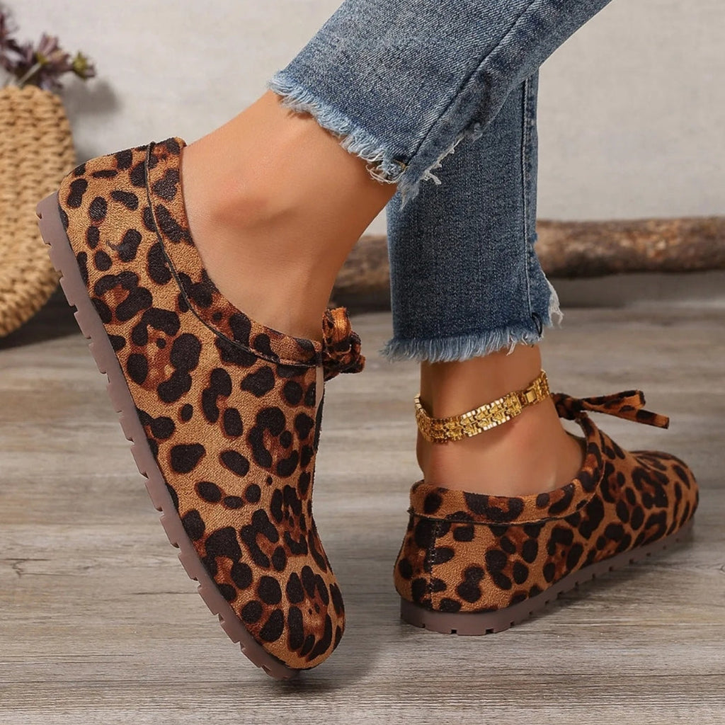 Mocassini leopardati in camoscio sintetico con fiocco donna