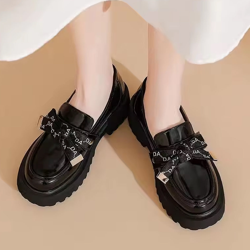 Mocassino platform nero con fiocco da donna