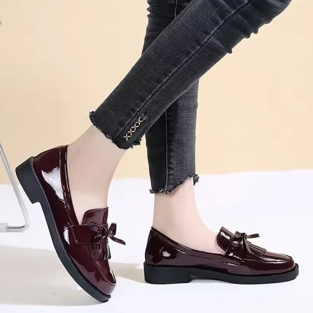 Mocassino verniciato con frange e fiocco
