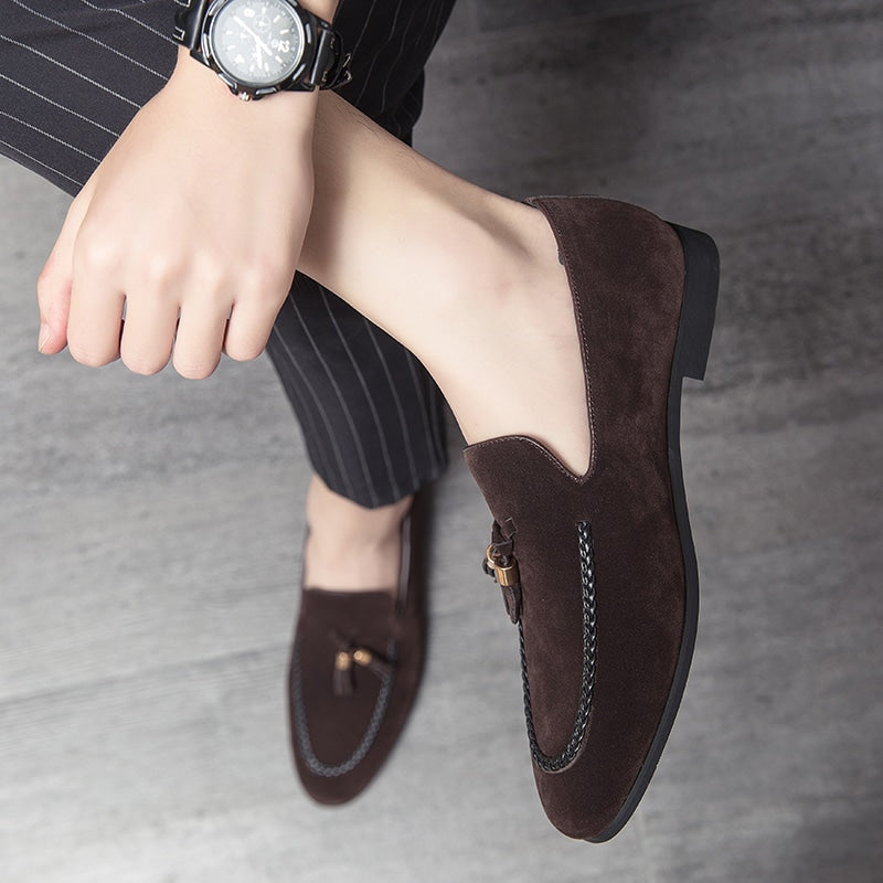 Mocassini con nappine in camoscio e torsade in pelle