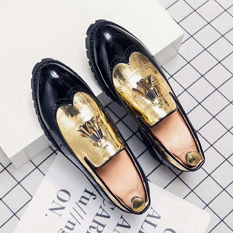 Mocassini con nappine nero e oro stile derby