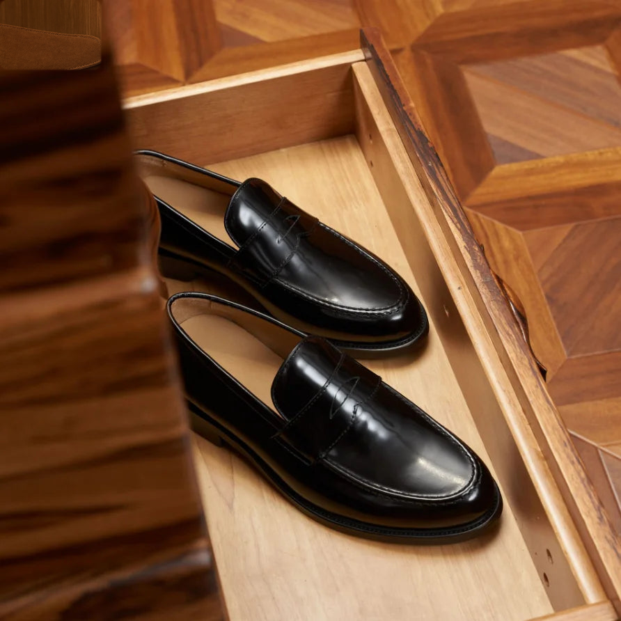 Mocassini penny uomo in camoscio nero