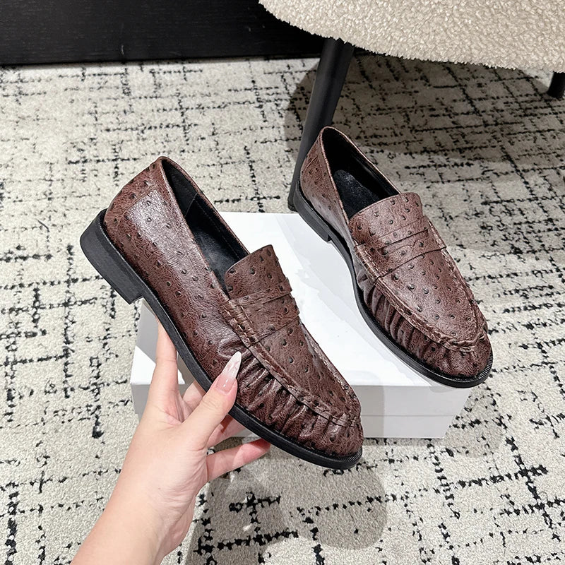 Mocassino donna nero effetto struzzo